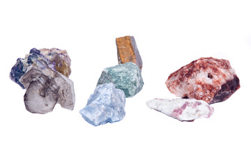 Raw gem stones separated on white background