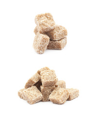 Pile of brown sugar cubes isolated