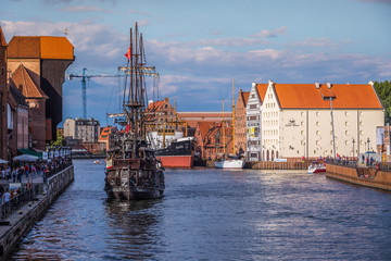 Obraz premium Gdansk,Poland-September 19,2015:Tourist ship and colourful histo