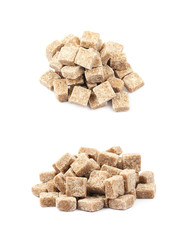 Pile of brown sugar cubes isolated
