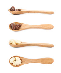 Spoon of chocolate candies isolated