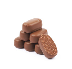 Chocolate coated toffee candy isolated