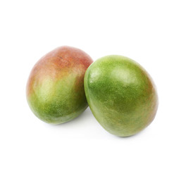 Two mango fruits isolated