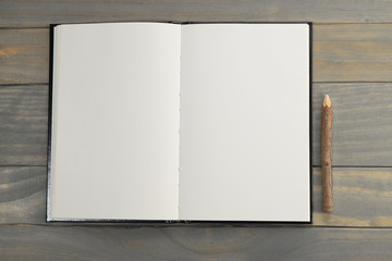 Blank notebook with wooden pencil