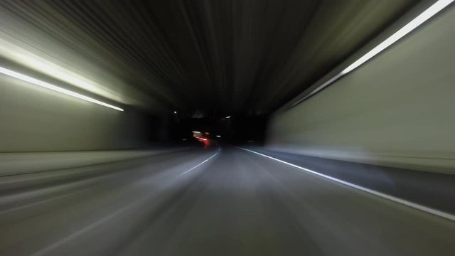 Night driving car mount time lapse through the 210 freeway tunnels in Pasadena, California.