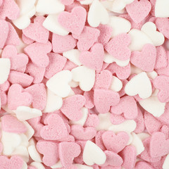 Surface coated with heart shaped sprinkles