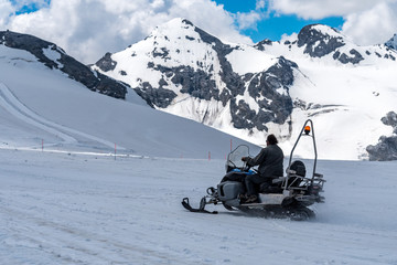 Snowmobile in high Alps Austria