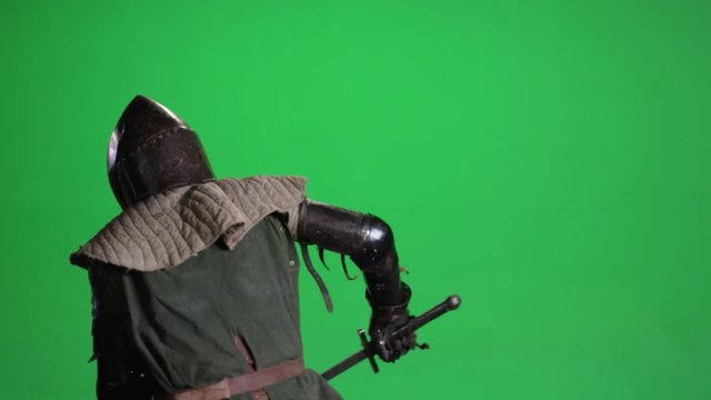 Knight Fighting with Sword on a Green Screen