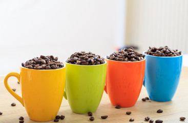 Fototapeta na wymiar Cups full of coffee beans