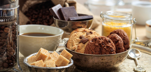 A cup of coffee on an old tray