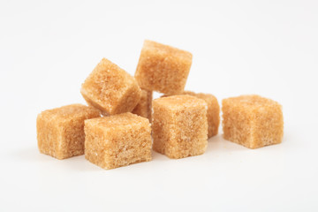 Sugar cubes on white background