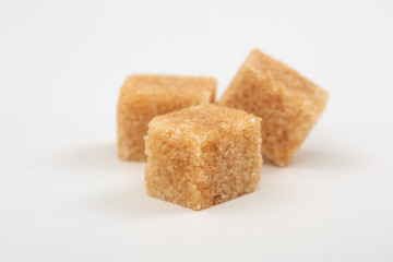 Sugar cubes on white background