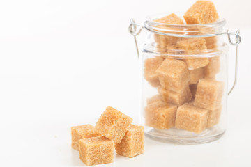 Sugar cubes on white background