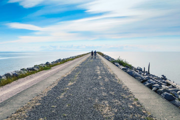Couple walking holding hands