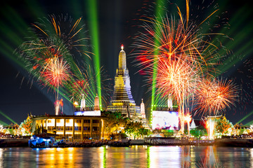 Wat Arun Temple with fireworks and laser lighting effects