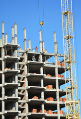 Tower cranes hook on the construction of the building site