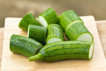 Snake gourd on wooden background