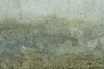 Old brick wall with plaster and decal