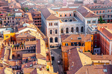Aerial cityscape view from the tower on Bologna old town with neo-renaissance palace in Italy