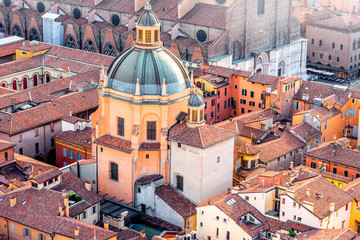 Aerial cityscape view from the tower on Bologna old town with Santa Maria della Vita church in Italy
