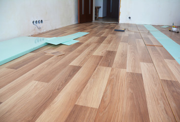 Laminate flooring interior. Installing wooden laminate flooring.