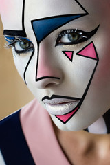 closeup portrait, beautiful girl model with creative graphic face art