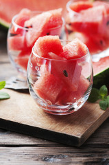Sweet red watermelon and mint on the wooden table