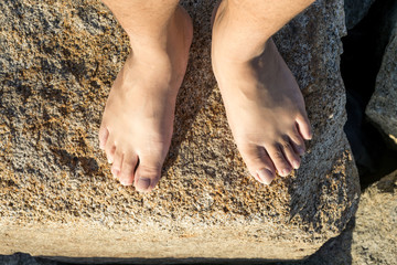 Foots on stone