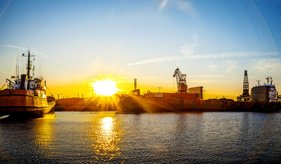 Ship at sunset in shipyard of Gdansk, Poland.