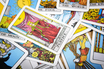 Tarot cards mystical old  background. Senior card justice.