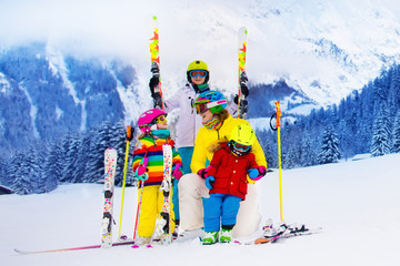 Family with children on winter ski vacation