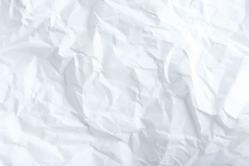 The white crumpled paper background