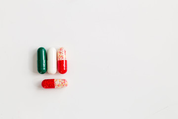 tablets and pills on the white table. Medicine concept