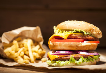 Fresh burger on wooden background