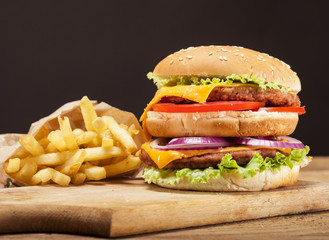 Fresh burger on wooden background