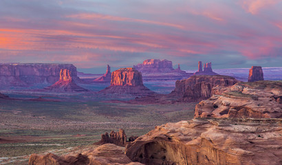 Hunts Mesa Sunset - Hunts Mesa is a rock formation located in Monument Valley, south of the border...