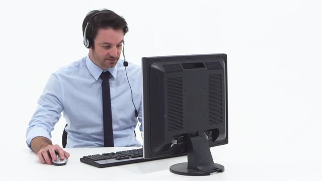 Man telemarketer using computer