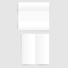 Two Blank white folded paper templates on gray background with shadow