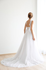 Fototapeta na wymiar Bride in a beautiful wedding dress