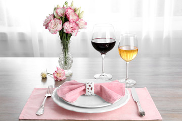 Beautiful table setting with flowers