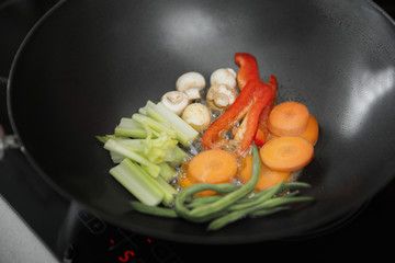 Fresh vegetables in pan closeup