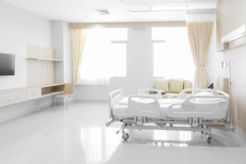 Hospital room with beds and comfortable medical equipped - obrazy, fototapety, plakaty