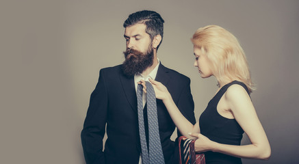 young couple with tie
