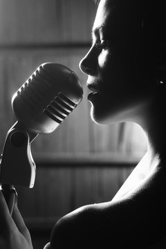 sensual woman with microphone