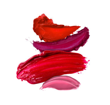 multi color lipstick smudged background on white