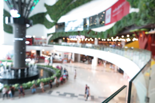 Shopping mall, modern trade with people in blur background