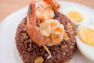 Fired brown rice with shrimp, carrot  and boiled egg healthy clean food none oil added low fat