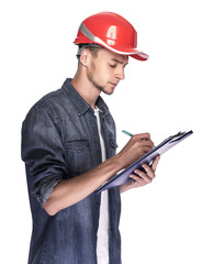 Young man in a construction helmet.