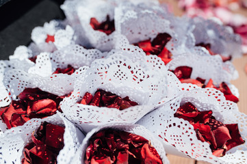 top view of envelopes with rose petals for event
