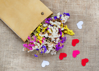 Boxes for gifts with flowers and paper hearts